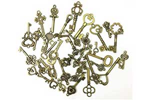  Oumefar Juego de 69 llaves antiguas vintage surtidas, dijes de  llave de bronce, kits de bricolaje, llaves de esqueleto, corazón elegante,  arco, joyería, suministros de arte : Arte y Manualidades